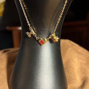 Avon “I love Christmas” faux gold ankle bracelet.